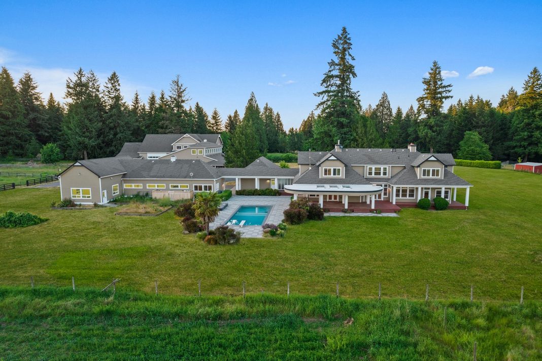 An Aerial photo of the back of 7417 Johnson Road SE, with a view of the pool
