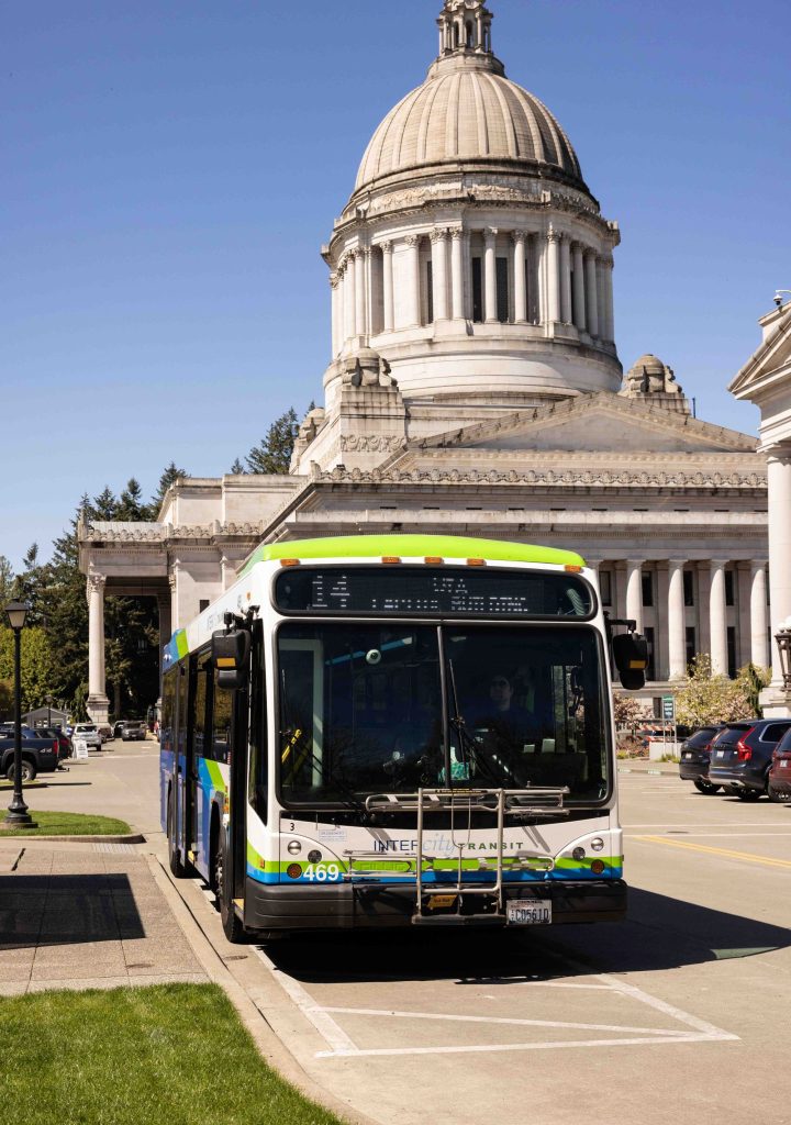 an Intercity Transit bus in front of the the Olympia capitol building