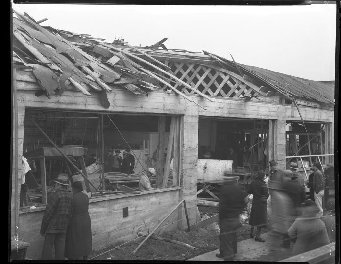 olympia history-Olympia-Milk-Producers-Association-bombing-1936 damaged building with walls missing and roof collapsed, black and white photo